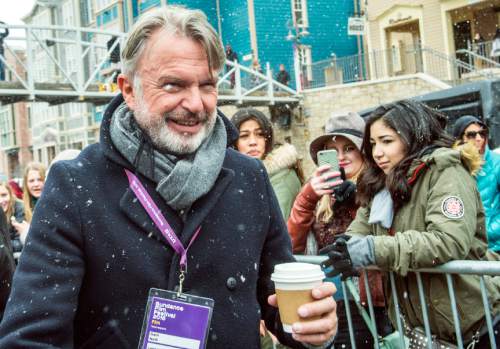 Chris Detrick  |  The Salt Lake Tribune
Fans try to take pictures of Sam Neill as he walks up Main Street during the Sundance Film Festival in Park City on Saturday.