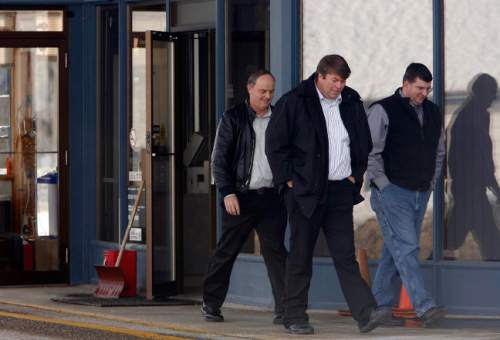 Leah Hogsten  |  The Salt Lake Tribune

Fundamentalist Church of Jesus Christ of Latter Day Saints spokesman Willie Jessop (center), walking out of the Canada Border Service Agency building at the Canada-Idaho border with Dowayne Barlow (right), and Ianthus Barlow (left). Jessop was stopped and detained Friday December 9, 2008, while traveling with two companions and was not allowed to enter the country.