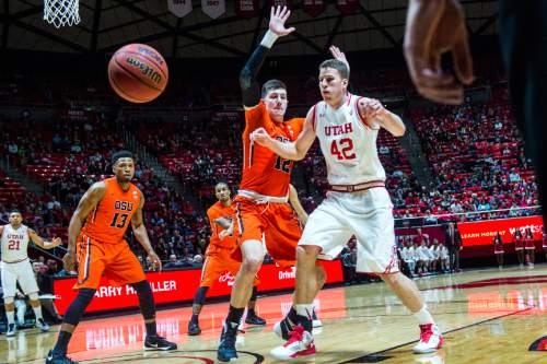 Chris Detrick  |  The Salt Lake Tribune
Utah Utes forward Jakob Poeltl (42) and Oregon State Beavers forward Drew Eubanks (12) go for the ball during the game at the Huntsman Center Sunday January 17, 2016.