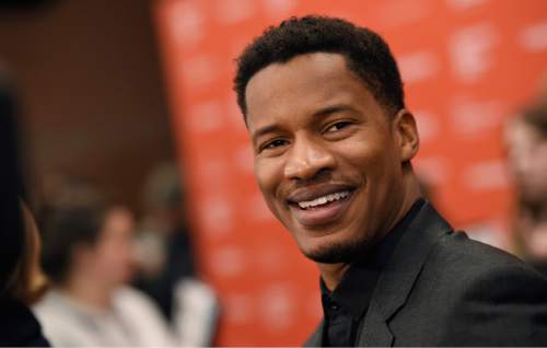 Nate Parker, the star, director and producer of "The Birth of a Nation," arrives at the premiere of the film at the 2016 Sundance Film Festival on Monday, Jan. 25, 2016, in Park City, Utah. (Photo by Chris Pizzello/Invision/AP)