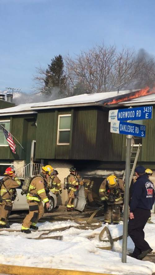 Cottonwood Heights police help woman escape flames The Salt Lake Tribune