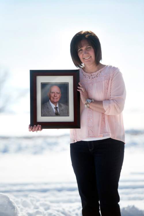Chris Detrick  |  The Salt Lake Tribune
Darlene Richens poses for a portrait holding a picture of her father, Roger Boisjoly, at her home in Nephi on Wednesday, Jan. 27, 2016. Boisjoly, an engineer at Morton-Thiokol, recommended against launching Space Shuttle Challenger the night before it exploded shortly after launch 30 years ago.
