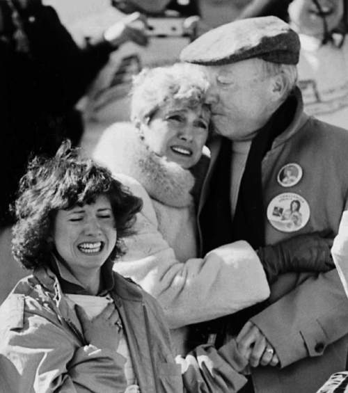 Jim Cole  |  Associated Press file photo
The family of Christa McAuliffe, a teacher who was America's first civilian astronaut, react shortly after seeing Space Shuttle Challenger -- which McAuliffe was aboard -- explode at the Kennedy Space Center on Tuesday, Jan. 28, 1986. Shown are Christa's sister, Betsy, front, and parents Grace and Ed Corrigan.