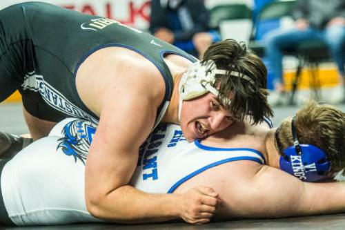 Chris Detrick  |  The Salt Lake Tribune
Pleasant Grove's Brandon Closson and Herriman's Wade French wrestle in the 220 pound during the 5A State Duals at the Maverik Center Thursday January 28, 2016.