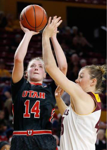 Utah's Paige Crozon (14) shoots over Arizona State's Eliza Normen, right, during the first half of an NCAA college basketball game Sunday, Jan. 17, 2016, in Tempe, Ariz. (AP Photo/Ross D. Franklin)