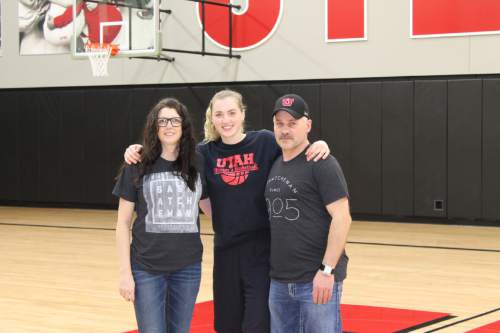|  Courtesy Crozon Family

Utah junior forward Paige Crozon poses with parents Leanne Crozon and Gary Crozon at a recent visit to the Huntsman basketball practice facility. Crozon is averaging 12.8 points and 8.4 rebounds for the Utes this season after struggling with injuries much of her career.