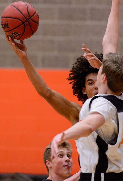 Trent Nelson  |  The Salt Lake Tribune
Ogden High School basketball player Hunter Clarke at practice in Ogden, Thursday January 28, 2016. Ogden's basketball program has registered two winnings seasons since 2001, with zero playoff wins. In the past two seasons before this year, the Tigers were collectively 6-39, including 0-22 in 2013. This season, they're competing for a region championship.