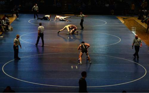 Steve Griffin  |  The Salt Lake Tribune

High school wrestlers battle on three mats during the Simplii All-Star Dual, a premier preseason wrestling tournament, at Utah Valley University in Orem, Tuesday, January 5, 2016.