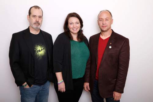 David Wheeler, from left, Nicole Hockley and Mark Barden pose for a portrait to promote the film, "Newtown", at the Toyota Mirai Music Lodge during the Sundance Film Festival on Sunday, Jan. 24, 2016, in Park City, Utah. (Photo by Matt Sayles/Invision/AP)
