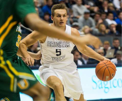 Rick Egan  |  The Salt Lake Tribune

Brigham Young Cougars guard Kyle Collinsworth (5) brings the ball across the middle, in basketball action BYU vs. San Francisco, at the Marriott Center, Saturday, January 9, 2015.