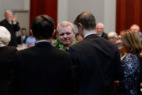 Trent Nelson  |  The Salt Lake Tribune
John A. Pearce looks to his family, Jonas, Ben and his wife Jennifer Napier-Pearce at his Investiture Ceremony as a justice for the Utah Supreme Court, in Salt Lake City, Friday January 29, 2016.