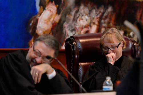 Trent Nelson  |  The Salt Lake Tribune
Justices and Constandinos Himonas and Christine Durham laugh as John A. Pearce speaks at his Investiture Ceremony as a justice for the Utah Supreme Court, in Salt Lake City, Friday January 29, 2016.