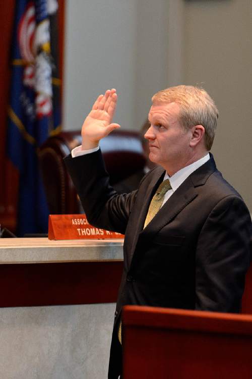 Trent Nelson  |  The Salt Lake Tribune
John A. Pearce is sworn in at his Investiture Ceremony as a justice for the Utah Supreme Court, in Salt Lake City, Friday January 29, 2016.