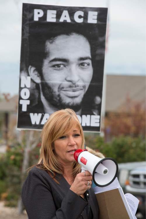 Rick Egan  |  The Salt Lake Tribune

Darrien Hunt's aunt, Cindy Moss, makes a speech to supporters, during a rally in  Saratoga Springs , for justice for Darrien Hunt, Friday, November 14, 2014