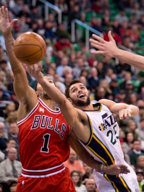 Lennie Mahler  |  The Salt Lake Tribune

Raul Neto drives past Derrick Rose in the first half of a game between the Utah Jazz and the Chicago Bulls on Monday, Feb. 1, 2016, at Vivint Smart Home Arena.