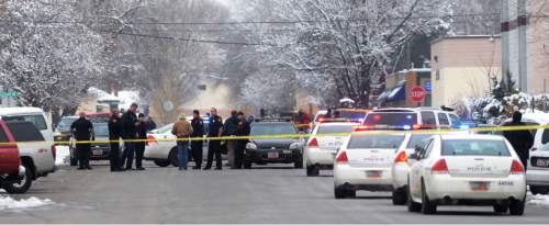 Steve Griffin  |  The Salt Lake Tribune


Salt Lake City Police officers at the scene of an officer involved shooting near 1300 south and Major Street (50 south) in Salt Lake City, Sunday, January 31, 2016.