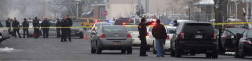 Steve Griffin  |  The Salt Lake Tribune


Salt Lake City Police officers at the scene of an officer involved shooting near 1300 south and Major Street (50 south) in Salt Lake City, Sunday, January 31, 2016.