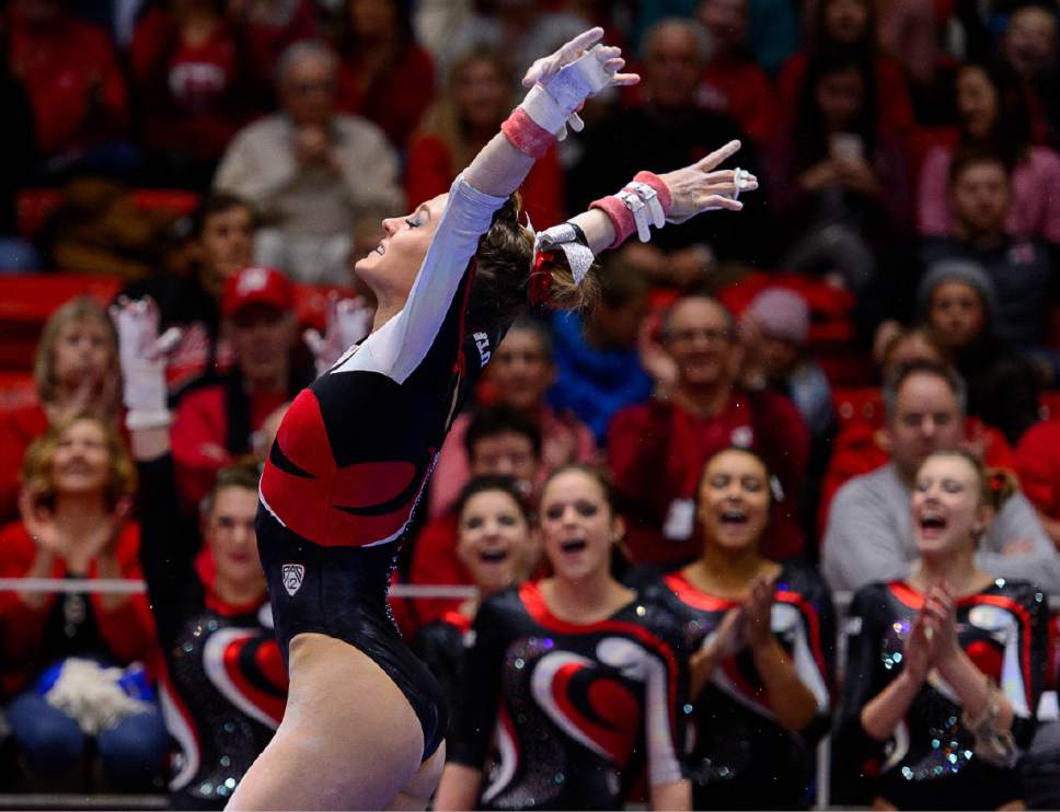 Trent Nelson  |  The Salt Lake Tribune
Utah's Tiffani Lewis competes on the bars as the University of Utah hosts Arizona, NCAA gymnastics at the Huntsman Center in Salt Lake City, Monday February 1, 2016.