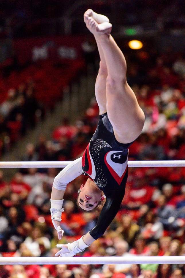 Trent Nelson  |  The Salt Lake Tribune
Utah's Baely Rowe competes on the bars as the University of Utah hosts Arizona, NCAA gymnastics at the Huntsman Center in Salt Lake City, Monday February 1, 2016.