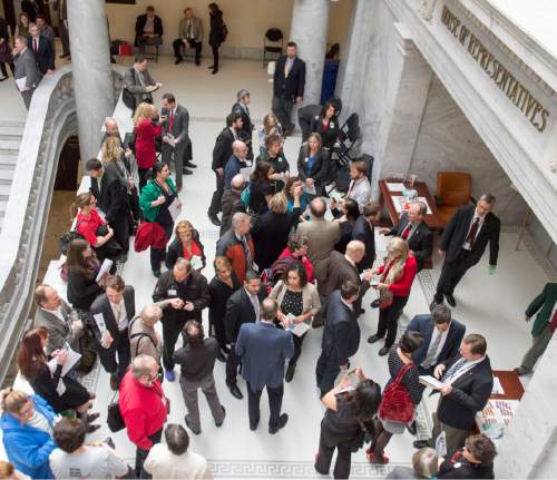 Rick Egan  |  The Salt Lake Tribune

Lobbyists wait outside the doors of the Utah House of Representatives. Registered lobbyists outnumber lawmakers by a four-to-one margin. Friday, February 5, 2016.