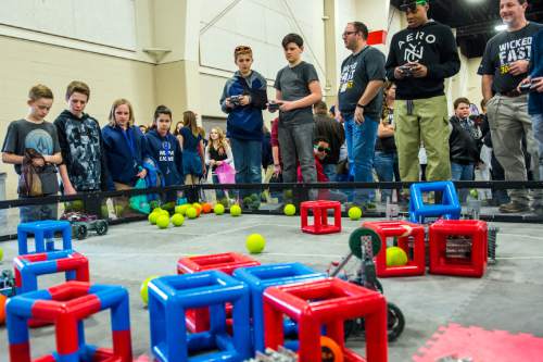 Chris Detrick  |  The Salt Lake Tribune
 Students interact with VEX Robotics during Utah's Second Annual STEM Fest at South Towne Expo Center Tuesday February 2, 2016.  More than 18,000 seventh through 10th grade students will engage with science, technology, engineering and math (STEM) through interactive experiences.