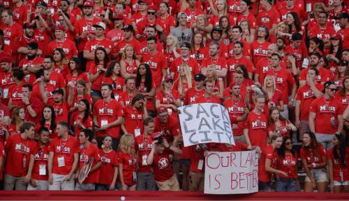 Francisco Kjolseth | The Salt Lake Tribune
Utah fans cheer on the team as they battle the Michigan Wolverings in game action at Rice Eccles Stadium on Thursday, Sept. 3, 2015.
