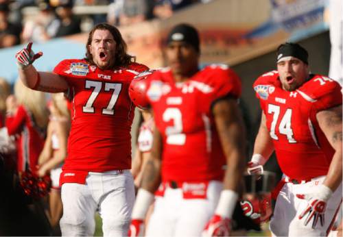 Trent Nelson  |  The Salt Lake Tribune
Utah's John Cullen (77) Kenneth Scott (2) and Sam Brenner react to play in the fourth quarter as the University of Utah faces Georgia Tech, college football at the Sun Bowl in El Paso, Texas, Saturday, December 31, 2011.