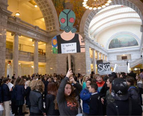 Al Hartmann  |  The Salt Lake Tribune
More than 300 local students from the Madeleine Choir School, Salt Lake Arts Academy and more marched up State Street to meet in the Capitol rotunda for a clean air Thursday, Feb. 4.