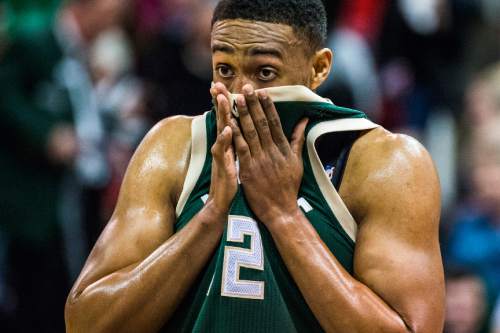 Chris Detrick  |  The Salt Lake Tribune
Milwaukee Bucks forward Jabari Parker (12) wipes his face with his jersey during the game at Vivint Smart Home Arena Friday February 5, 2016.