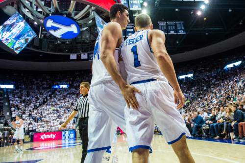 Chris Detrick  |  The Salt Lake Tribune
Brigham Young Cougars center Corbin Kaufusi (44) and Brigham Young Cougars guard Chase Fischer (1) during the game at the Marriott Center Thursday February 4, 2016. Brigham Young Cougars defeated St. Mary's Gaels 70-59.