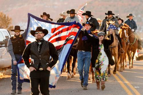 Trent Nelson  |  The Salt Lake Tribune
Riders on horseback ride in a procession following the funeral for Robert "LaVoy" Finicum, in Kanab, Friday February 5, 2016. Finicum was shot and killed by police during a January 26 traffic stop. Finicum was part of the armed occupation of an Oregon wildlife refuge.