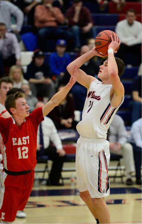 Scott Sommerdorf   |  The Salt Lake Tribune
Woods Cross' Trevin Knell took the game away from East in the second half with a run of three point shots. Woods Cross beat East 65-56, Friday, February 5, 2016.