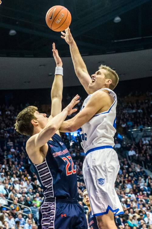 Chris Detrick  |  The Salt Lake Tribune
Brigham Young Cougars forward Kyle Davis (21) shoots over St. Mary's Gaels forward Dane Pineau (22) during the game at the Marriott Center Thursday February 4, 2016. Brigham Young Cougars defeated St. Mary's Gaels 70-59.
