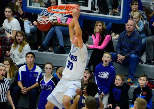 Scott Sommerdorf   |  The Salt Lake Tribune
Pleasant Grove fans react to Brody Childs' monster dunk during second half play. Westlake defeated Pleasant Grove 76-72 in double overtime, Friday, January 8, 2016.