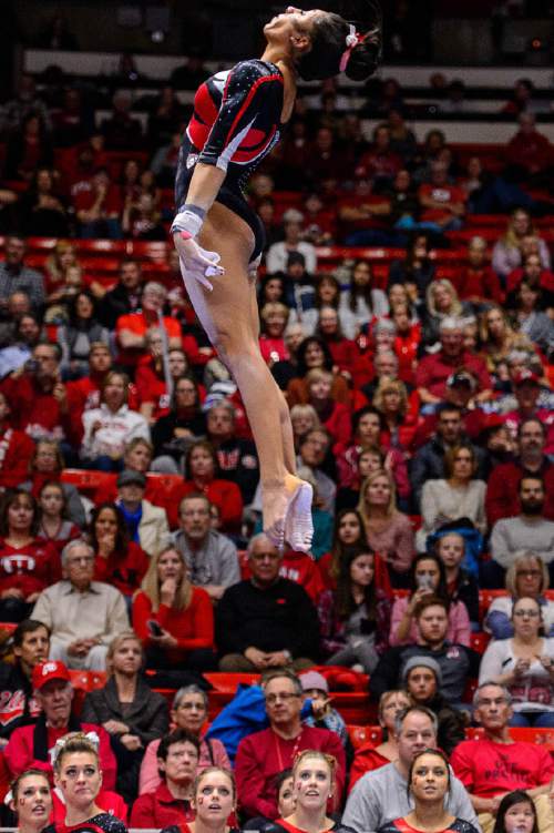 Trent Nelson  |  The Salt Lake Tribune
Utah's Kassandra Lopez competes on the bars as the University of Utah hosts Arizona, NCAA gymnastics at the Huntsman Center in Salt Lake City, Monday February 1, 2016.