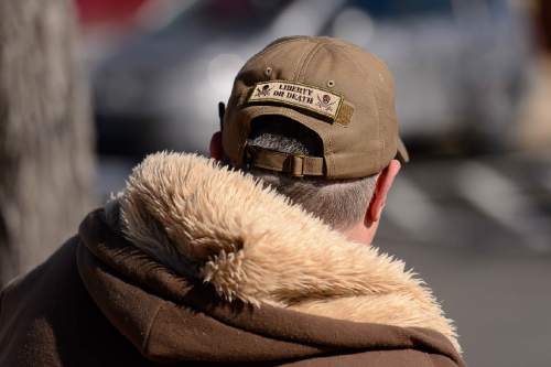 Trent Nelson  |  The Salt Lake Tribune
A patch reads "Liberty or Death" on the hat of a man working security at the funeral for Robert "LaVoy" Finicum, in Kanab, Friday February 5, 2016. Finicum was shot and killed by police during a January 26 traffic stop. Finicum was part of the armed occupation of an Oregon wildlife refuge.