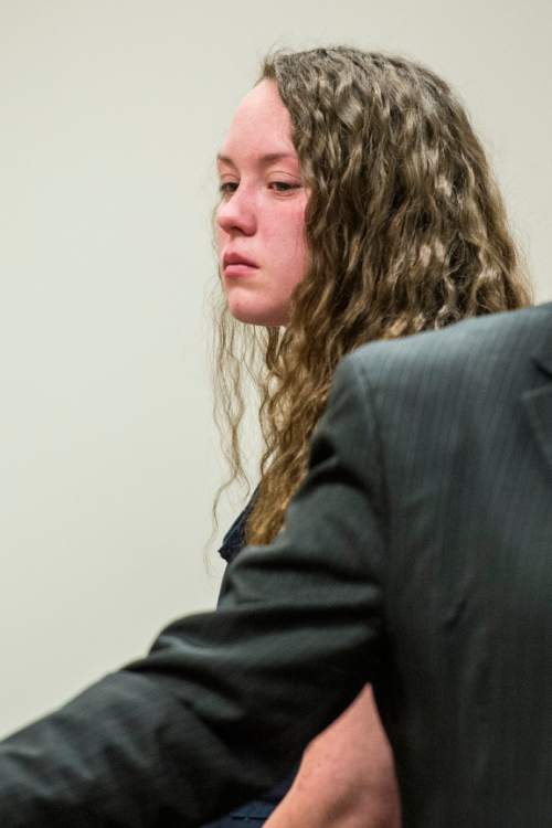 Chris Detrick  |  The Salt Lake Tribune
Meagan Grunwald reacts during her sentencing at 4th District Court in Provo Wednesday July 8, 2015.  Eighteen-year-old Meagan Grunwald was sentenced Wednesday to 25 years to life in prison for being an accomplice to the murder last year of Utah County Sheriff's Sgt. Cory Wride and the attempted murder of Deputy Greg Sherwood.