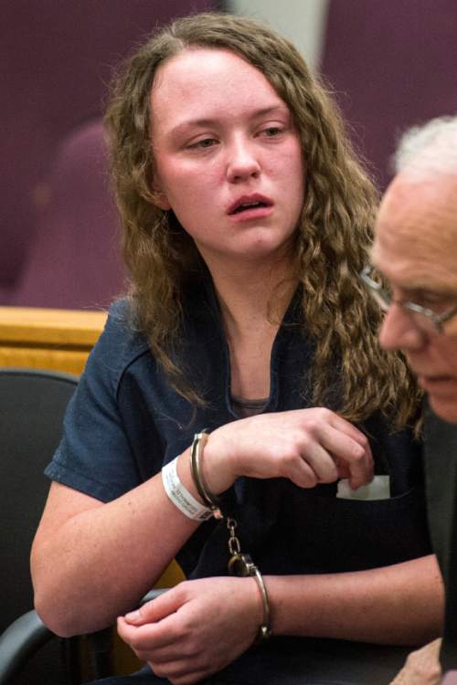 Chris Detrick  |  The Salt Lake Tribune
Meagan Grunwald reacts during her sentencing at 4th District Court in Provo Wednesday July 8, 2015.  Eighteen-year-old Meagan Grunwald was sentenced Wednesday to 25 years to life in prison for being an accomplice to the murder last year of Utah County Sheriff's Sgt. Cory Wride and the attempted murder of Deputy Greg Sherwood.