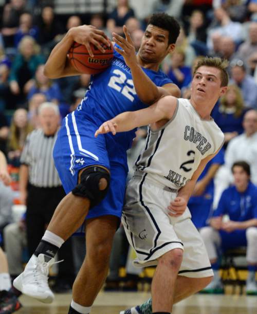 Steve Griffin  |  The Salt Lake Tribune


Bingham's Yoeli Childs grabs the ball after blocking Copper Hills guard Copper Hills guard Trevor Hoffman's shot as the Grizzlies host No. 1 Bingham in a pivotal Region 3 boys' basketball game at Copper Hills High School in West Jordan, Tuesday, February 9, 2016.