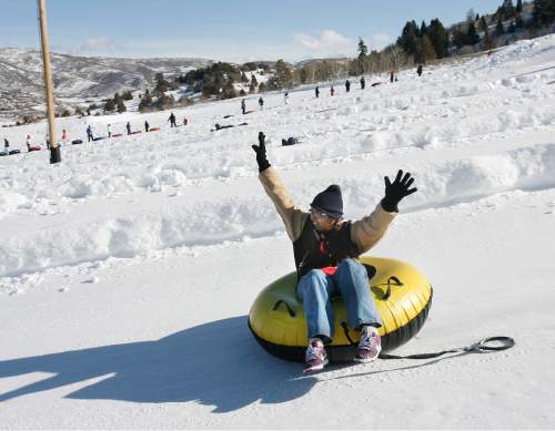 Scott Sommerdorf   |  The Salt Lake Tribune

Visitors to Gorgoza Park in Jeremy Ranch slide, Sunday, December 23, 2012.