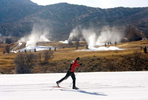 Al Hartmann  |  The Salt Lake Tribune

Cross Country skier finishes a loop around the 3K track at Soldier Hollow Cross County  Center Ski Resort near Midway on Monday January 9, 2012 as snow making machines spray out man-made snow to make up for the deficit of natural snow for this time of year.