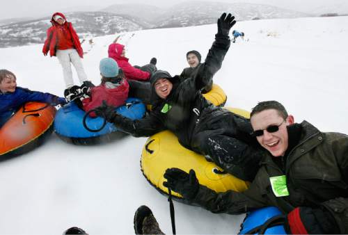 Scott Sommerdorf  l  The Salt Lake Tribune

Tubers from left: Will Prettyman, Brooke Barrigar, Desire Ferris, Allen Ferris, Skylar Ferris, and Dakota Ferris begin a run down the hill connected together. Tubing at Soldier Hollow inside Wasatch Mountain State Park in Midway, Sunday December 19, 2010.