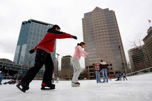Al Hartmann  |  The Salt Lake Tribune

Kids skate at the Gallivan Center Ice rink in Salt Lake City on Tuesday January 31, 2006.