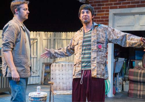 Rick Egan  |  The Salt Lake Tribune

Mathew Sincell and Stefan Espinosa rehearse in Salt Lake Acting Company's  "Streetlight Woodpecker," a new play by Logan playwright Shawn Fisher.