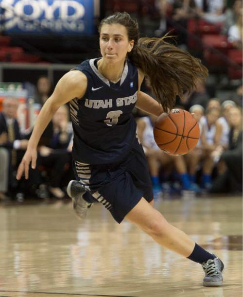 Rick Egan  |  The Salt Lake Tribune

Utah State guard/forward Funda Nakkasoglu (3) takes the ball inside for the Aggies, in the Mountain West Conference Basketball Championships, at the Thomas & Mac Center, in Las Vegas,  Monday, March 9, 2015