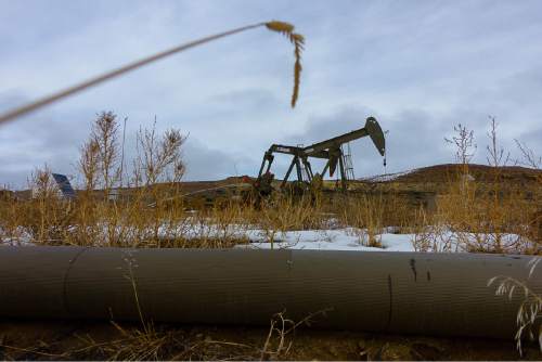 Trent Nelson  |  The Salt Lake Tribune
Oil wells along the Nine Mile Canyon National Backcountry Byway in Duchesne County, Tuesday January 19, 2016.