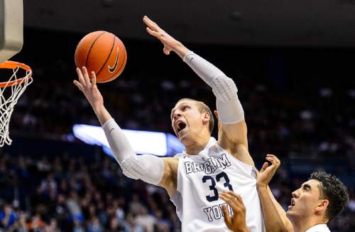 Trent Nelson  |  The Salt Lake Tribune
Brigham Young Cougars forward Nate Austin (33) pulls down a rebound as BYU hosts Mississippi Valley State, NCAA basketball at the Marriott Center in Provo, Wednesday November 25, 2015.