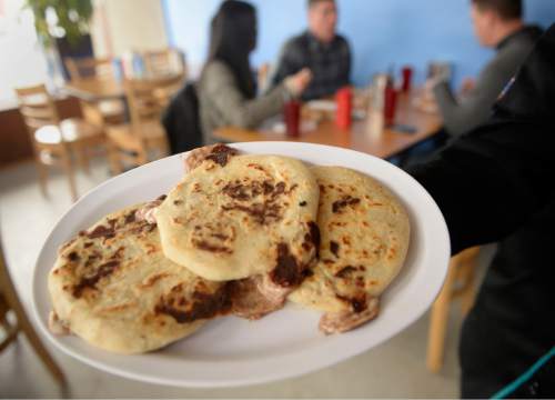 Al Hartmann  |  The Salt Lake Tribune
Pork, bean and cheese papusas at  Cafe Guanaco, a Salvadoran restaurant at 499 E. 2700 South in South Salt Lake. Add cabbage and red sauce to your liking.
