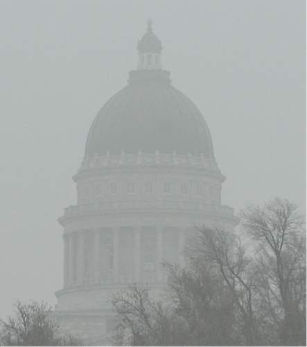 Francisco Kjolseth | The Salt Lake Tribune
Pool air quality blankets the valley, obscuring visibility and increasing health concerns. A sizable source of emissions, comes from "warming up" your car, a widespread practice in Utah.Last month Salt Lake City police found 600 unattended, idling vehicles in the space of three hours, even though it's completely unnecessary. For modern cars, all idling does is release a lot of emissions.