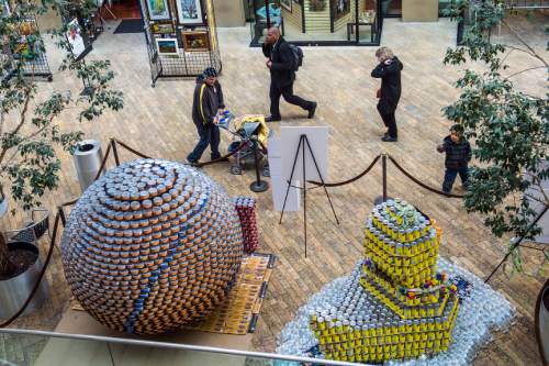 Chris Detrick  |  The Salt Lake Tribune
Food sculptures on display at the Salt Lake City Main Library Tuesday February 9, 2016.  Six local health care–related businesses have built giant sculptures using healthy canned, bagged, and boxed foods. The public is invited to view the sculptures between February 8 and 14 during regular library hours. After that time, the food will be donated to the Utah Food Bank. Patrons also are encouraged to bring their own healthy food items to donate; for every nonperishable food item donated at The City Library, patrons will receive $1 off overdue fines. Visitors may also vote for their favorite Food Design sculpture in the "People's Choice" award category.